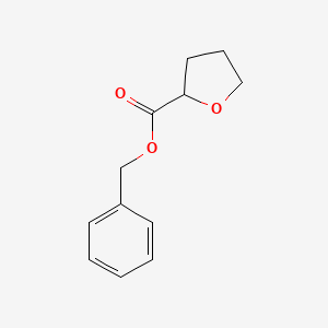 2-Furancarboxylic acid, tetrahydro-, phenylmethyl ester