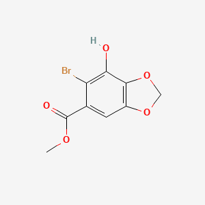 molecular formula C9H7BrO5 B3287924 Methyl 6-bromo-7-hydroxybenzo[d][1,3]dioxole-5-carboxylate CAS No. 848772-89-4