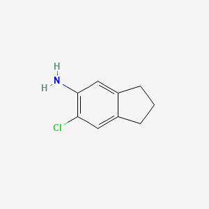 molecular formula C9H10ClN B3289471 6-chloro-2,3-dihydro-1H-inden-5-amine CAS No. 858225-64-6