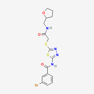 B3296352 3-bromo-N-{5-[({[(oxolan-2-yl)methyl]carbamoyl}methyl)sulfanyl]-1,3,4-thiadiazol-2-yl}benzamide CAS No. 893159-96-1