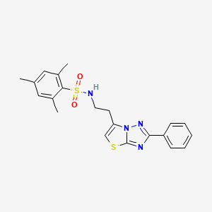 molecular formula C21H22N4O2S2 B3297222 2,4,6-trimethyl-N-(2-(2-phenylthiazolo[3,2-b][1,2,4]triazol-6-yl)ethyl)benzenesulfonamide CAS No. 895420-70-9