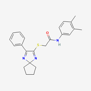 molecular formula C23H25N3OS B3299387 N-(3,4-Dimethylphenyl)-2-({3-phenyl-1,4-diazaspiro[4.4]nona-1,3-dien-2-YL}sulfanyl)acetamide CAS No. 899906-40-2