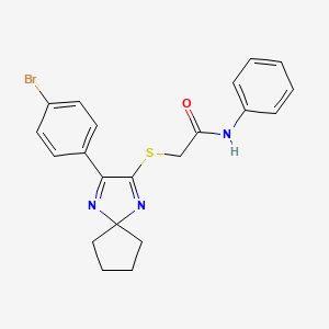 molecular formula C21H20BrN3OS B3299546 2-((3-(4-bromophenyl)-1,4-diazaspiro[4.4]nona-1,3-dien-2-yl)thio)-N-phenylacetamide CAS No. 899913-02-1