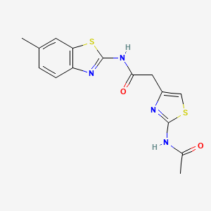 molecular formula C15H14N4O2S2 B3304416 2-(2-acetamidothiazol-4-yl)-N-(6-methylbenzo[d]thiazol-2-yl)acetamide CAS No. 921800-85-3