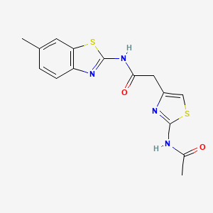 molecular formula C15H14N4O2S2 B3304416 2-(2-acetamido-1,3-thiazol-4-yl)-N-(6-methyl-1,3-benzothiazol-2-yl)acetamide CAS No. 921800-85-3