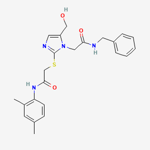 molecular formula C23H26N4O3S B3304497 2-{[1-[2-(benzylamino)-2-oxoethyl]-5-(hydroxymethyl)-1H-imidazol-2-yl]thio}-N-(2,4-dimethylphenyl)acetamide CAS No. 921822-12-0