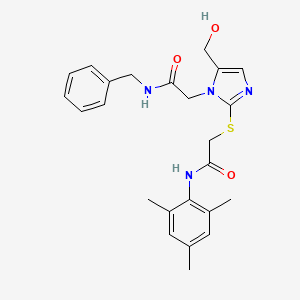 molecular formula C24H28N4O3S B3304814 2-{[1-[2-(benzylamino)-2-oxoethyl]-5-(hydroxymethyl)-1H-imidazol-2-yl]thio}-N-mesitylacetamide CAS No. 921886-12-6