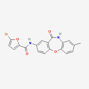 molecular formula C19H13BrN2O4 B3305003 5-bromo-N-{6-methyl-10-oxo-2-oxa-9-azatricyclo[9.4.0.0^{3,8}]pentadeca-1(11),3(8),4,6,12,14-hexaen-13-yl}furan-2-carboxamide CAS No. 922109-41-9