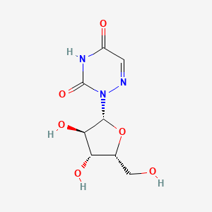 molecular formula C8H11N3O6 B3307037 2-[(2R,3R,4R,5R)-3,4-Dihydroxy-5-(hydroxymethyl)oxolan-2-yl]-1,2,4-triazine-3,5-dione CAS No. 93060-34-5