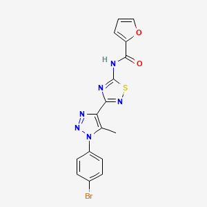 molecular formula C16H11BrN6O2S B3307097 N-{3-[1-(4-bromophenyl)-5-methyl-1H-1,2,3-triazol-4-yl]-1,2,4-thiadiazol-5-yl}furan-2-carboxamide CAS No. 931364-14-6
