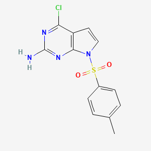 molecular formula C13H11ClN4O2S B3307863 4-chloro-7-[(4-methylphenyl)sulfonyl]-7H-pyrrolo[2,3-d]pyrimidin-2-amine CAS No. 934524-13-7