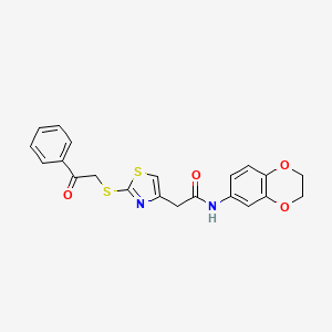 molecular formula C21H18N2O4S2 B3311151 N-(2,3-dihydrobenzo[b][1,4]dioxin-6-yl)-2-(2-((2-oxo-2-phenylethyl)thio)thiazol-4-yl)acetamide CAS No. 946242-00-8