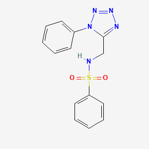 molecular formula C14H13N5O2S B3312929 N-((1-phenyl-1H-tetrazol-5-yl)methyl)benzenesulfonamide CAS No. 946335-53-1