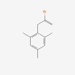 molecular formula C12H15B B3315510 2-Bromo-3-(2,4,6-trimethylphenyl)-1-propene CAS No. 951893-35-9