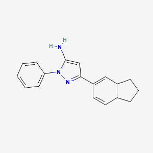 molecular formula C18H17N3 B3317125 3-(2,3-dihydro-1H-inden-5-yl)-1-phenyl-1H-pyrazol-5-amine CAS No. 956411-52-2