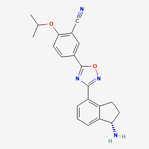 molecular formula C21H20N4O2 B3321049 (S)-5-(3-(1-amino-2,3-dihydro-1H-inden-4-yl)-1,2,4-oxadiazol-5-yl)-2-isopropoxybenzonitrile CAS No. 1306760-73-5