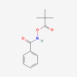 N-[(2,2-Dimethylpropanoyl)oxy]benzamide