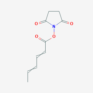 molecular formula C10H11NO4 B3333416 1-[(Hexa-2,4-dienoyl)oxy]pyrrolidine-2,5-dione CAS No. 98453-85-1