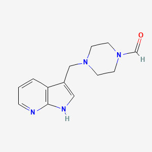 molecular formula C13H16N4O B3355424 4-((1H-Pyrrolo[2,3-b]pyridin-3-yl)methyl)piperazine-1-carbaldehyde CAS No. 625386-56-3