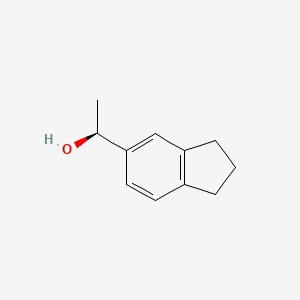 molecular formula C11H14O B3365216 (1S)-1-(2,3-dihydro-1H-inden-5-yl)ethan-1-ol CAS No. 1212252-42-0