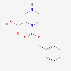 molecular formula C13H16N2O4 B3365309 (S)-1-((Benzyloxy)carbonyl)piperazine-2-carboxylic acid CAS No. 1217437-93-8