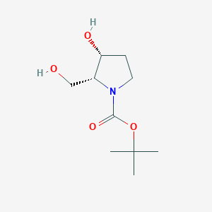 molecular formula C10H19NO4 B3365467 (2R,3R)-tert-butyl 3-hydroxy-2-(hydroxymethyl)pyrrolidine-1-carboxylate CAS No. 123076-44-8