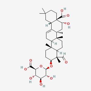 molecular formula C36H54O11 B3366592 (2S,3S,4S,5R,6R)-6-[[(3S,4S,4aR,6aR,6bS,8R,8aR,12aS,14aR,14bR)-8a-carboxy-4-formyl-8-hydroxy-4,6a,6b,11,11,14b-hexamethyl-1,2,3,4a,5,6,7,8,9,10,12,12a,14,14a-tetradecahydropicen-3-yl]oxy]-3,4,5-trihydroxyoxane-2-carboxylic acid CAS No. 1393-03-9