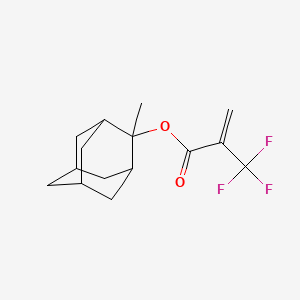 molecular formula C15H19F3O2 B3367682 2-(2-Trifluoromethyl-2-propenoyloxy)-2-methyladamantane CAS No. 188739-86-8