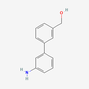 molecular formula C13H13NO B3368337 [3-(3-Aminophenyl)phenyl]methanol CAS No. 208941-45-1