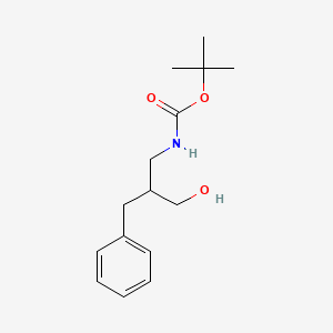 molecular formula C15H23NO3 B3373742 tert-butyl N-(2-benzyl-3-hydroxypropyl)carbamate CAS No. 1015069-95-0