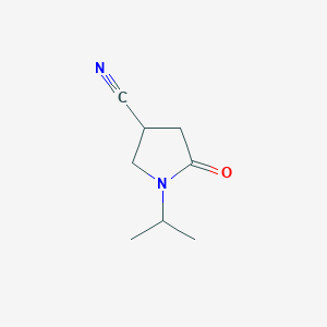 molecular formula C8H12N2O B3374183 5-Oxo-1-(propan-2-yl)pyrrolidine-3-carbonitrile CAS No. 1017446-29-5
