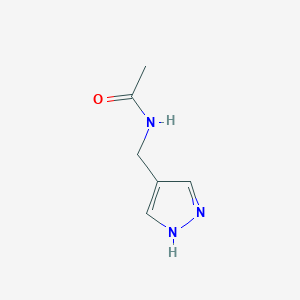 molecular formula C6H9N3O B3376322 N-[(1H-pyrazol-4-yl)methyl]acetamide CAS No. 1184541-34-1