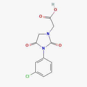 molecular formula C11H9ClN2O4 B3378293 2-[3-(3-Chlorophenyl)-2,4-dioxoimidazolidin-1-yl]acetic acid CAS No. 1411650-70-8