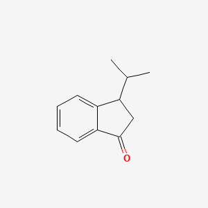molecular formula C12H14O B3381318 3-(propan-2-yl)-2,3-dihydro-1H-inden-1-one CAS No. 22531-07-3