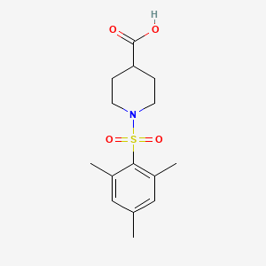 molecular formula C15H21NO4S B3383152 1-(Mesitylsulfonyl)piperidine-4-carboxylic acid CAS No. 394245-69-3