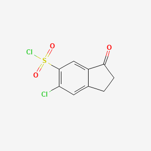 molecular formula C9H6Cl2O3S B3385533 6-chloro-3-oxo-2,3-dihydro-1H-indene-5-sulfonyl chloride CAS No. 64220-32-2