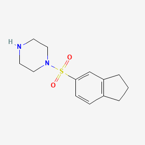 molecular formula C13H18N2O2S B3387234 1-(2,3-dihydro-1H-indene-5-sulfonyl)piperazine CAS No. 794582-39-1