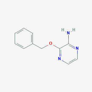 molecular formula C11H11N3O B033915 2-氨基-3-苄氧基吡嗪 CAS No. 110223-15-9