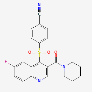 molecular formula C22H18FN3O3S B3403309 4-{[6-Fluoro-3-(piperidine-1-carbonyl)quinolin-4-yl]sulfonyl}benzonitrile CAS No. 1112363-94-6