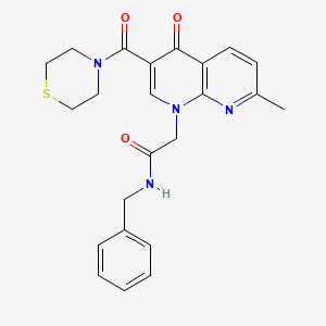 N-benzyl-2-(7-methyl-4-oxo-3-(thiomorpholine-4-carbonyl)-1,8-naphthyridin-1(4H)-yl)acetamide