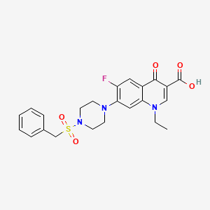 1-Ethyl-6-fluoro-4-oxo-7-(4-phenylmethanesulfonylpiperazin-1-yl)-1,4-dihydroquinoline-3-carboxylic acid