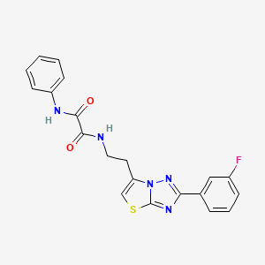 molecular formula C20H16FN5O2S B3413821 N1-(2-(2-(3-fluorophenyl)thiazolo[3,2-b][1,2,4]triazol-6-yl)ethyl)-N2-phenyloxalamide CAS No. 946273-41-2