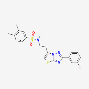 molecular formula C20H19FN4O2S2 B3413848 N-(2-(2-(3-fluorophenyl)thiazolo[3,2-b][1,2,4]triazol-6-yl)ethyl)-3,4-dimethylbenzenesulfonamide CAS No. 946274-49-3