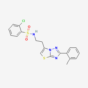 molecular formula C19H17ClN4O2S2 B3414155 2-chloro-N-(2-(2-(o-tolyl)thiazolo[3,2-b][1,2,4]triazol-6-yl)ethyl)benzenesulfonamide CAS No. 946306-20-3