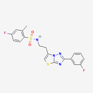 4-fluoro-N-(2-(2-(3-fluorophenyl)thiazolo[3,2-b][1,2,4]triazol-6-yl)ethyl)-2-methylbenzenesulfonamide