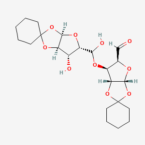 (3Ar,5S,6S,6aR)-6-[[(3aR,5S,6S,6aR)-6-hydroxyspiro[3a,5,6,6a-tetrahydrofuro[2,3-d][1,3]dioxole-2,1'-cyclohexane]-5-yl]-hydroxymethoxy]spiro[3a,5,6,6a-tetrahydrofuro[2,3-d][1,3]dioxole-2,1'-cyclohexane]-5-carbaldehyde
