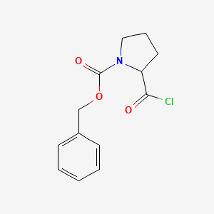 molecular formula C13H14ClNO3 B3433876 1-Pyrrolidinecarboxylic acid, 2-(chlorocarbonyl)-, phenylmethyl ester CAS No. 61350-60-5