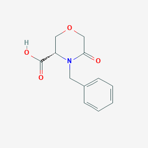 molecular formula C12H13NO4 B034575 (S)-4-Benzyl-5-oxomorpholine-3-carboxylic Acid CAS No. 106973-37-9