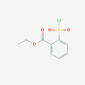 molecular formula C9H9ClO4S B034660 2-(Clorosulfonil)benzoato de etilo CAS No. 103008-54-4