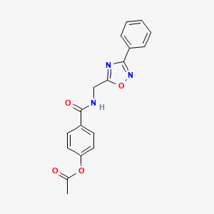 molecular formula C18H15N3O4 B3499564 4-({[(3-phenyl-1,2,4-oxadiazol-5-yl)methyl]amino}carbonyl)phenyl acetate 